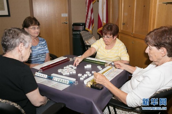 Americans playing mahjong [File photo: Xinhua]