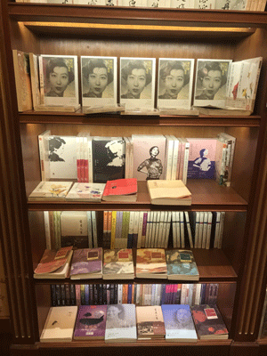 Colourful is stacked with Eileen's books.[Photo:ChinaPlus]