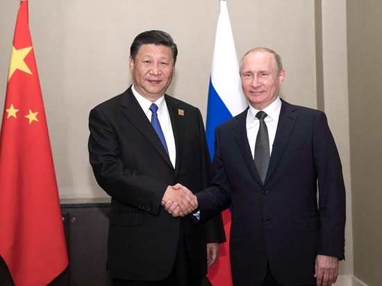 Chinese President Xi Jinping meets with his Russian counterpart Vladimir Putin in Astana, capital city of the Republic of Kazakhstan, on June 8, 2017. [Photo: Xinhua]
