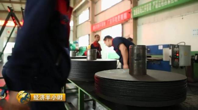 A screenshot from a China Central Television program showing steel-rubber bearings being manufactured at a factory in Shaanxi Province. [Photo: CCTV]