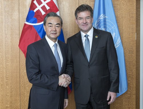 Chinese Foreign Minister Wang Yi(L) meets with Miroslav Lajcak during his stay in New York for the General Debate of the 72nd Session of the General Assembly of the United Nations on Monday, September 18, 2017. Miroslav Lajcak chairs the 72nd session of the assembly. [Photo: gov.cn]