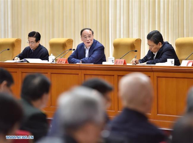Wang Qishan (C), a member of the Standing Committee of the Political Bureau of the Communist Party of China (CPC) Central Committee and secretary of the CPC Central Commission for Discipline Inspection, attends a meeting on anti-graft inspection in Beijing, capital of China, Feb. 23, 2016.[Photo: Xinhua]