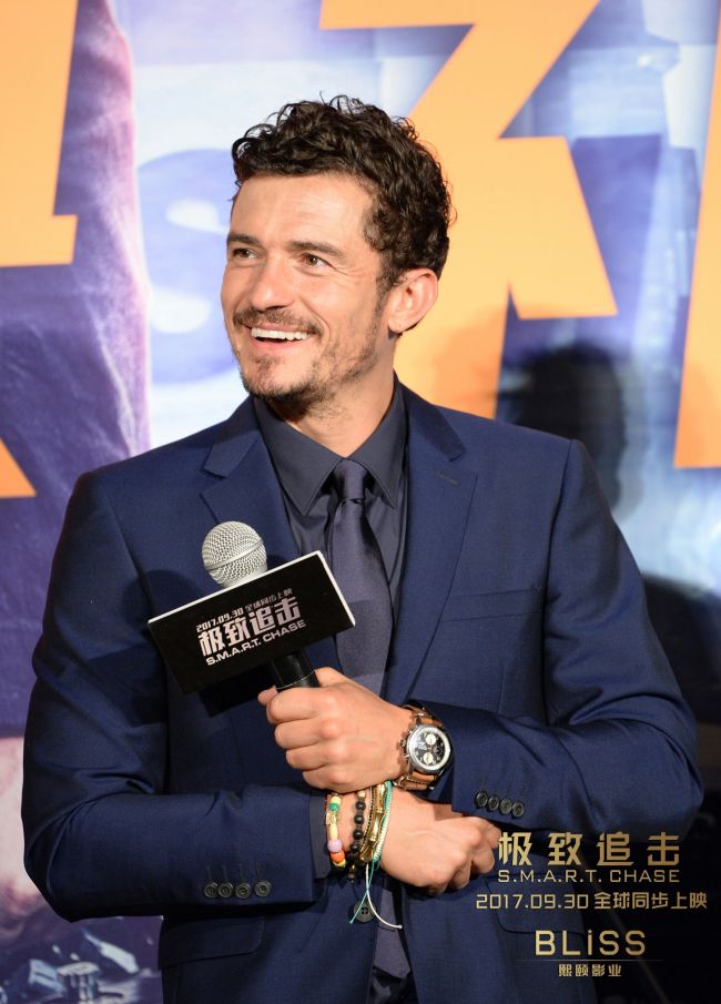 English actor Orlando Bloom answers question from a journalist in Beijing on September 20, 2017, ahead of the premiere of his upcoming action-packed thriller film 'Smart Chase.'[Photo: China Plus]