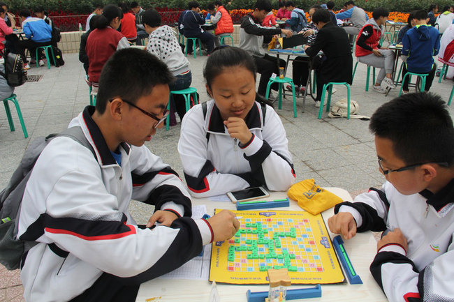 A group of students participating in the spelling bee competition 