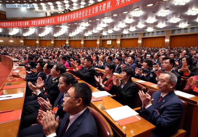 Delegates attend the closing session of the 19th National Congress of the Communist Party of China (CPC) at the Great Hall of the People in Beijing, capital of China, October 24, 2017. [Photo: news.cn]