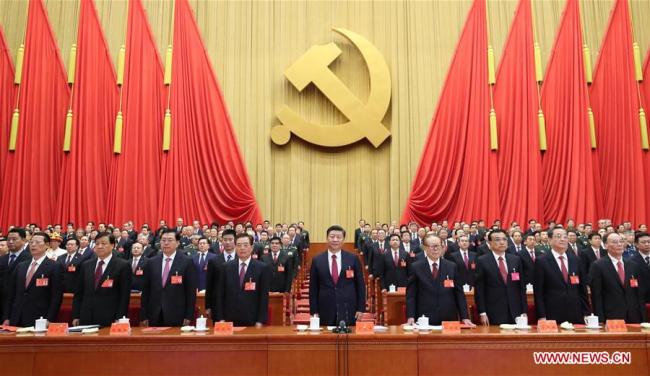 Xi Jinping (C, front), Li Keqiang (3rd R, front), Zhang Dejiang (3rd L, front), Yu Zhengsheng (2nd R, front), Liu Yunshan (2nd L, front), Wang Qishan (1st R, front), Zhang Gaoli (1st L, front), Jiang Zemin (4th R, front) and Hu Jintao (4th L, front) attend the closing session of the 19th National Congress of the Communist Party of China (CPC) at the Great Hall of the People in Beijing, capital of China, Oct. 24, 2017. [Photo: Xinhua]