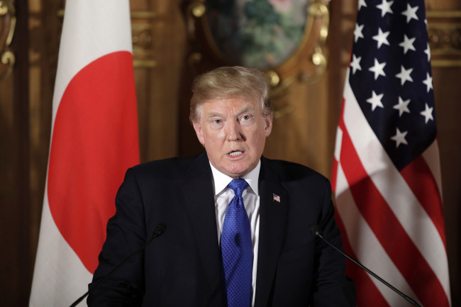 President Donald Trump speaks, accompanied by Japanese Prime Minister Shinzo Abe during a joint news conference at the Akasaka Palace, Monday, Nov. 6, 2017, in Tokyo.[Photo:AP]