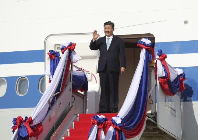 Chinese President Xi Jinping, also general secretary of the Communist Party of China (CPC) Central Committee, arrives in Laos for a state visit on Monday, November 13, 2017.