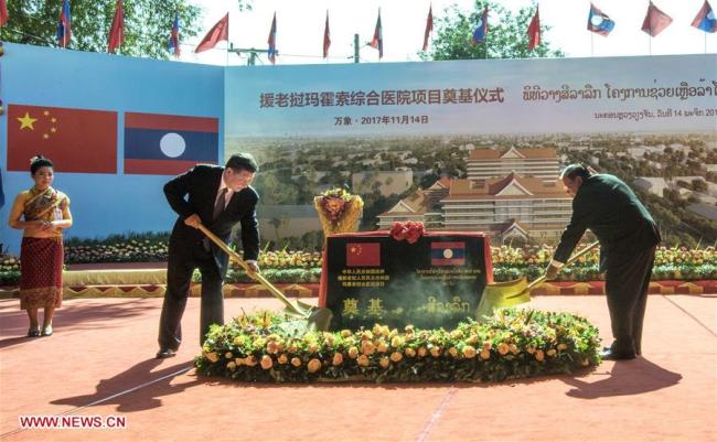 Chinese President Xi Jinping and his Laotian counterpart Bounnhang Vorachit attend the foundation stone laying ceremony for a China-built hospital in Vientiane on November 14, 2017. The two leaders also called for more China-Laos cooperation in public welfare. [Photo: Xinhua]