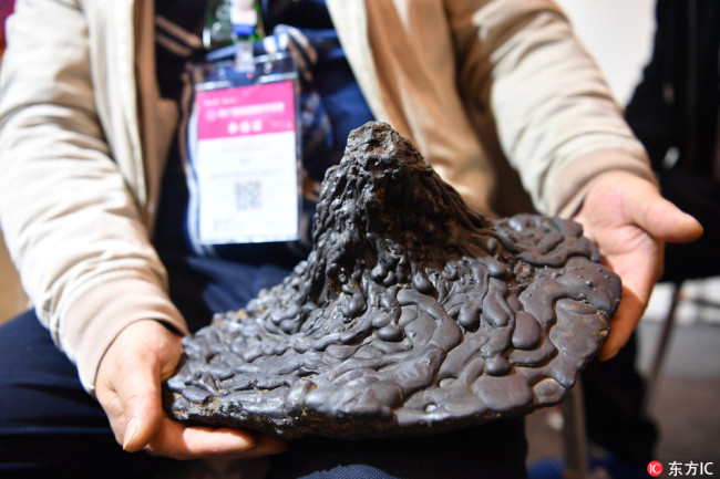 Aerolite reportedly found in Shangri-La was on display at a jewelry exhibition in Chengdu, Sichuan Province on November 18, 2017. [Photo: IC]
