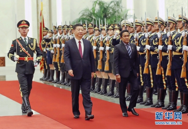 Chinese President Xi Jinping (center) holds a welcoming ceremony for Maldives President Abdulla Yameen Abdul Gayoom in Beijing, on Dec. 7, 2017. [Photo: Xinhua]