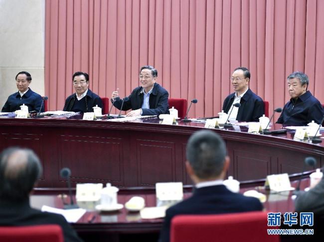 The session was chaired by Yu Zhengsheng, chairman of the National Committee of the Chinese People's Political Consultative Conference. [Photo: Xinhua]