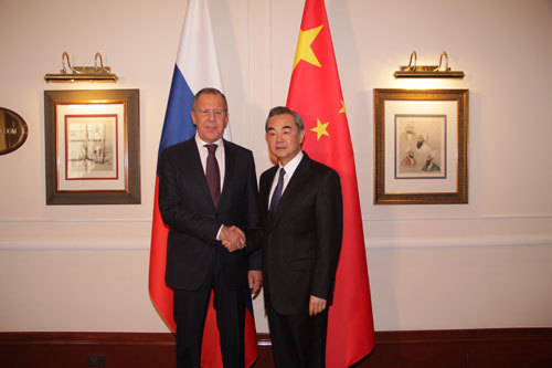 Chinese Foreign Minister Wang Yi (R) meets with his Russian counterpart Sergei Lavrov on the sidelines of the 15th trilateral meeting of foreign ministers of China, Russia in India on Monday, December 11, 2017. [Photo: fmprc.gov.cn]