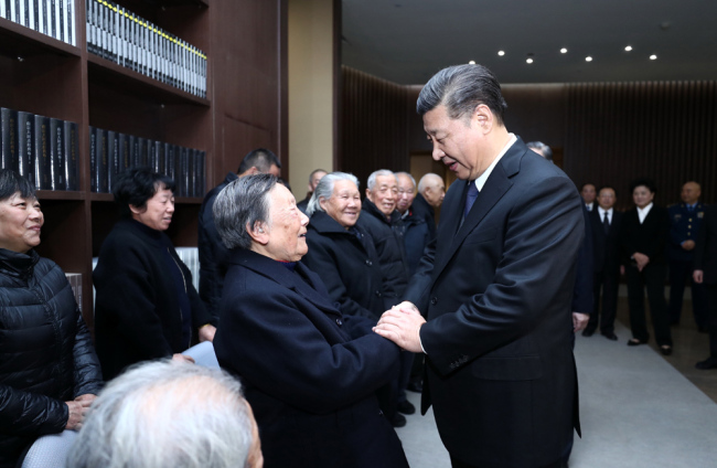 President Xi Jinping meets with survivors of the Nanjing Massacre, after a state memorial ceremony on December 13, 2017. [Photo: Xinhua]