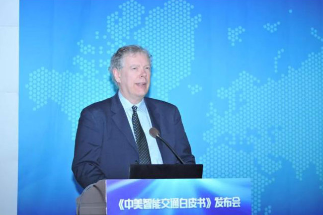 Darrell M. West, vice president and director of governance studies at the Brookings Institution speaks at a seminar to promote smart transportation cooperation between China and the US on Friday, December 15, 2017. [Photo: caict.ac.cn]