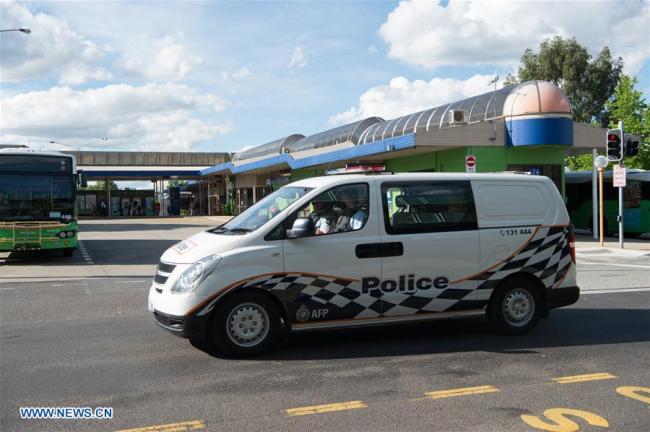 A police vehicle patrols an area where two Chinese students were attacked in southern Canberra, Australia, on October 27, 2017. [File photo: Xinhua]