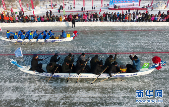 Ice dragon boat games in north China's Inner Mongolia [File photo: Xinhua]