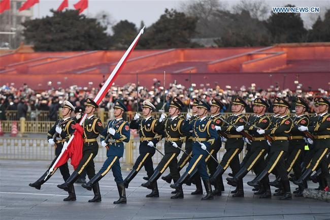 The Guard of Honor of the Chinese People's Liberation Army(PLA) perform the national flag-raising duty at the Tian'anmen Square in Beijing, capital of China, Jan. 1, 2018.[Photo: Xinhua/Shen Hong]