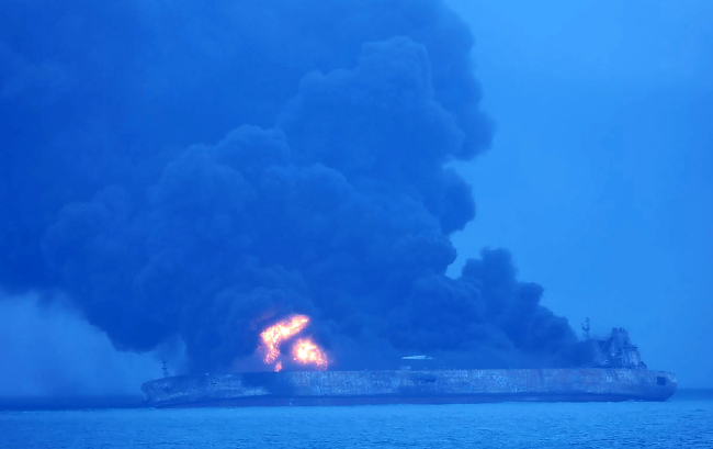 Photo taken on January 7, 2018 shows the Panamanian-flagged tanker "Sanchi" on fire after a collision with a cargo ship at sea. [Photo: VCG]