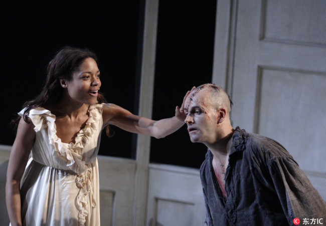 Actors Jonny Lee Miller (Right) and Naomie Harris (Left) in a scene from Danny Boyle's stage version of Frankenstein.[Photo:IC]