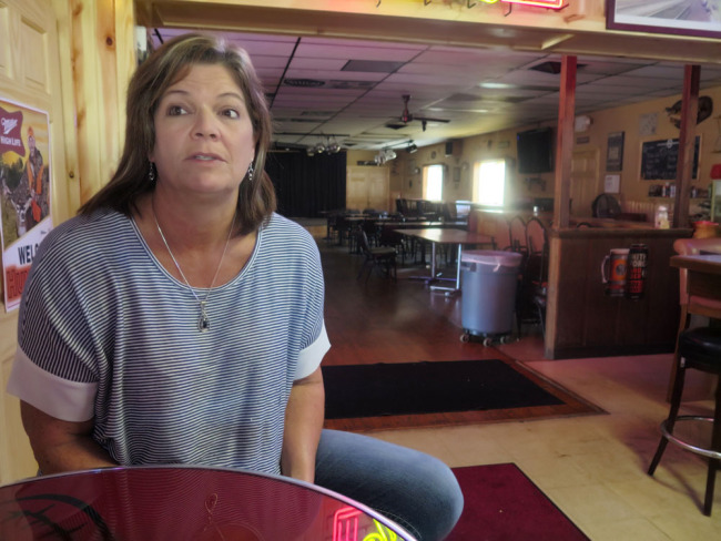 Tammy Graceffa, 51, owner of a local restaurant, talks in her restaurant on October 4, 2017 in Sturtevant, Wisconsin, about Foxconn's announcement of the location of its planned manufacturing plant in nearby Mount Pleasant. Graceffa owns land in the development site and said the news was bittersweet because she stands to benefit economically but she might lose the land where she grew up. [Photo: AP/Ivan Moreno]