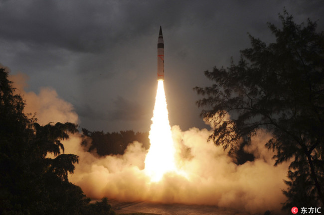 The photo released by India's Defence Research and Development Organisation shows that the nuclear-capable missile Agni-V is test fired in Wheeler Island, off the coast of Odisha, India, Sunday, Sept. 15, 2013. [Photo: IC]