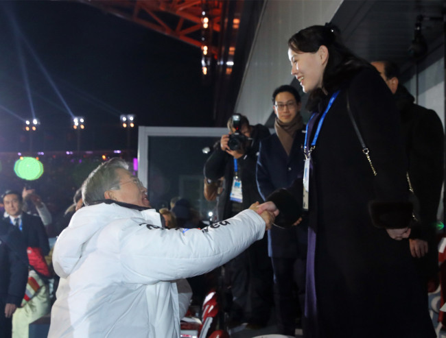 South Korean President Moon Jae-in shakes hands with Kim Yo Jong, sister of North Korean leader Kim Jong Un, at the opening ceremony of the 2018 PyeongChang Winter Olympics held at the PyeongChang Olympic Stadium in PyeongChang, South Korea, February 9, 2018. [Photo: IC]