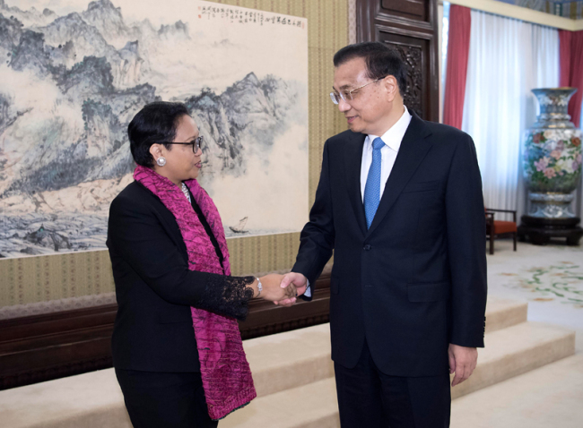 Chinese Premier Li Keqiang (R) meets with Indonesian Foreign Minister Retno Marsudi in Beijing on Friday, February 9, 2018. [Photo: gov.cn]