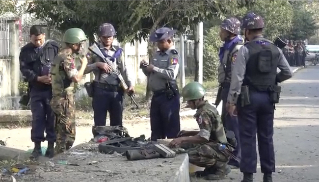 In this image made from video, police and officials inspect the site of a bomb explosion early Saturday, Feb. 24, 2018, in Sittwe, capital of Rakhine State, Myanmar. [Photo: AP]