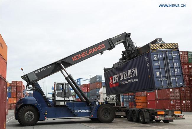 Photo taken on April 11, 2017 shows a cargo of China Railway Express being moved at Duisburg Intermodal Terminal (DIT) in Duisburg, western Germany. Since "YUXIN'OU" (Chongqing-Xinjiang-Europe) railway line came into use in 2011, China-Europe freight train services, with a growing number of trans-continental railway lines and increasing cargo volume, have become important to the ancient Silk Road.[Photo: Xinhua]