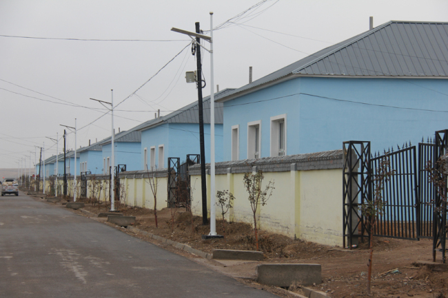 The most of new houses built by villagers in poverty are partly sponsored by the county government. [Photo: China Plus/Yang Guang]