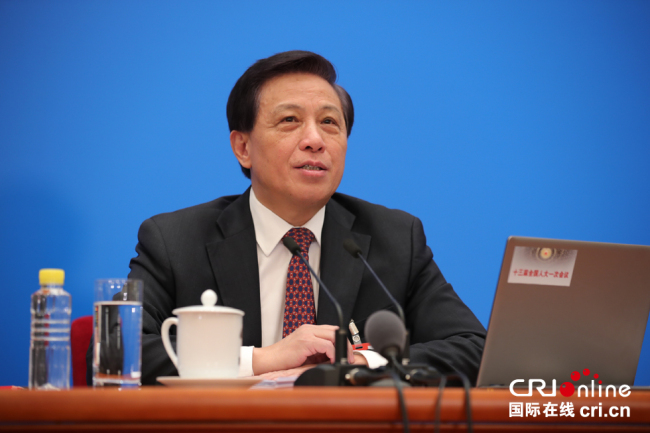 Zhang Yesui, executive vice-foreign minister since 2012, speaks as spokesman for the first session of China's 13th National People's Congress in Beijing, on Sunday, March 4, 2018. [Photo: China Plus]