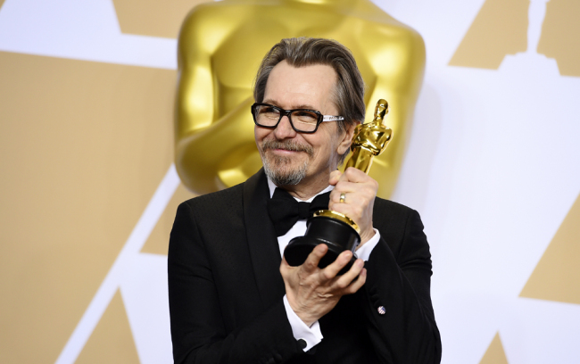 Gary Oldman, winner of the award for best performance by an actor in a leading role for "Darkest Hour", poses in the press room at the Oscars on March 4, 2018, at the Dolby Theatre in Los Angeles. [Photo: AP/Jordan Strauss]