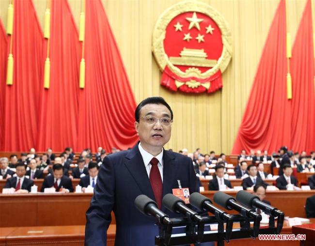 Chinese Premier Li Keqiang delivers a government work report at the opening meeting of the first session of the 13th National People's Congress at the Great Hall of the People in Beijing, capital of China, March 5, 2018.[Photo:xinhua]