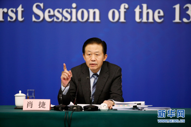 China’s Finance Minister Xiao Jie speaks at a press conference of the First Session of the 13th National People’s Congress in Beijing on March 7, 2017. [Photo: Xinhua]