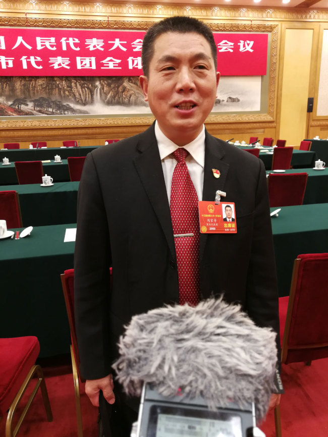 Liu Jiaqi, a deputy from the municipality of Chongqing for the 13th National People's Congress (NPC) is interviewed by journalists on March 10, 2018. [Photo: China Plus]