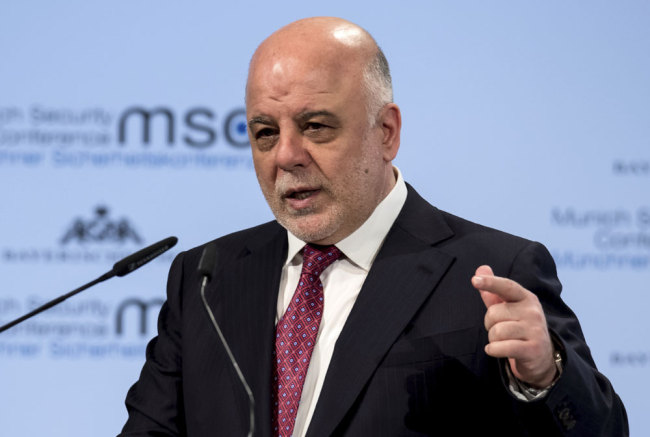 In this Feb. 17, 2018 photo Iraqi Prime Minister Haider al-Abadi, speaks at the Security Conference in Munich, Germany. [File photo: dpa via AP/Sven Hoppe]