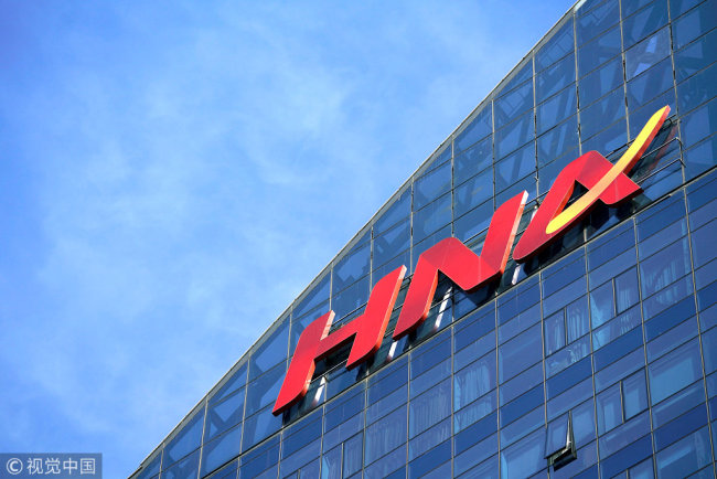 A HNA Group logo as seen on the HNA Plaza in Beijing, February 9, 2018 [File Photo: VCG]
