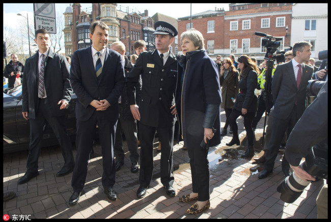 UK Prime Minister Theresa May visits Salisbury city centre on March 15, 2018, where Russian Sergei Skripal was attacked with a deadly substance and remains in hospital alongside his daughter Yulia. [Photo: IC]
