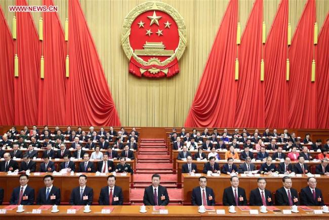 The 13th National People's Congress (NPC) holds the closing meeting of the first session of at the Great Hall of the People in Beijing, capital of China, March 20, 2018. [Photo: Xinhua]
