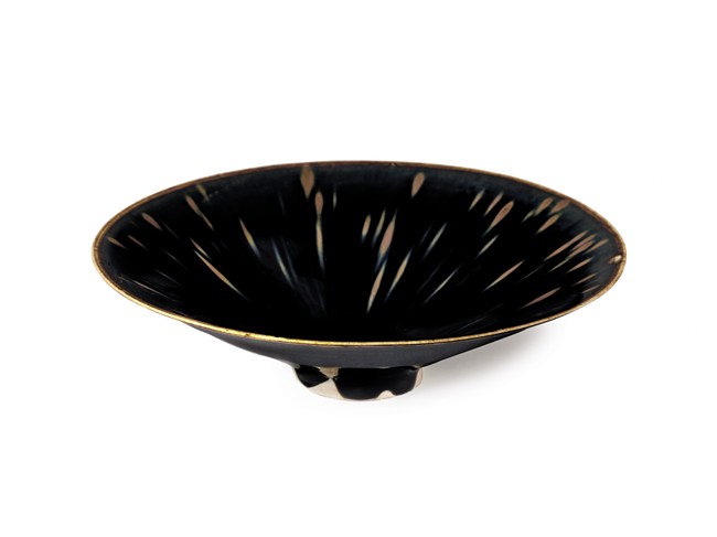 The museum-quality piece -- a Ding russet-splashed black-glazed conical bowl that dates back to the Northern Song Dynasty (960-1127) -- has been appraised as the most valuable piece among the artworks offered at Christie's in New York at the on-going Asian Art Week sales.[Photo: Christies.com]