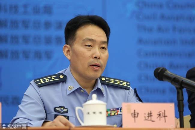 Shen Jinke, Senior Colonel and spokesperson of the Chinese People's Liberation Army Air Force (PLAAF) speaks at a news conference for the 10th China International Aviation and Aerospace Exhibition on September 16, 2014. [Photo: VCG]