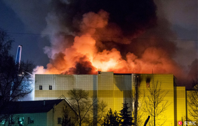 A fire breaks out at a shopping mall in Russia's south central city of Kemerovo, leaving at least 56 people dead. [Photo: IC/Danil Aikin/TASS]