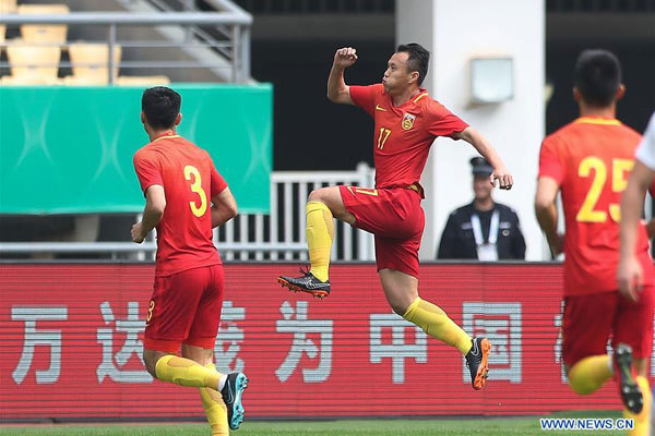 Fan Xiaodong (2nd L) of China celebrates scoring during the match between China and the Czech Republic at the 2018 China Cup International Football Championship in Nanning, capital of south China's Guangxi Zhuang Autonomous Region, March 26, 2018. [Photo: Xinhua/Cao Can]