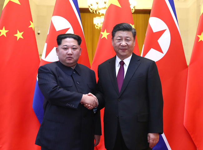 At the invitation of Xi Jinping, general secretary of the Central Committee of the Communist Party of China (CPC) and Chinese president, Kim Jong Un, chairman of the Workers' Party of Korea (WPK) and chairman of the State Affairs Commission of the Democratic People's Republic of Korea (DPRK), has paid an unofficial visit to China from March 25 to 28. During the visit, Xi held talks with Kim at the Great Hall of the People in Beijing. Xi held a welcoming ceremony for Kim before their talks. [Photo: Xinhua/Ju Peng]