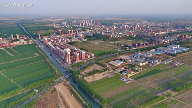 Photo taken on April 21, 2017 shows the scenery of the county seat of Rongcheng, north China's Hebei Province. China announced the plan for Xiongan New Area officially on April 1, 2017. The new area will span Xiongxian, Rongcheng and Anxin counties in Hebei Province, eventually covering 2,000 square kilometers. [Photo: Xinhua]