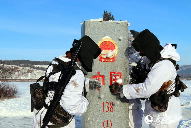 Frontier forces in China's northernmost county Mohe in Heilongjiang Province, patrol the Sino-Russian border in -40 degrees Celsius temperatures on January 19, 2018. The soldiers undertake daily patrols to ensure the safety of tourists and stability of the border area, despite the extremes of heavy snow and freezing winds. [Photo: people.cn]