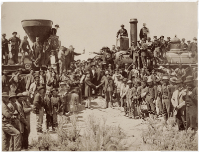 In Andrew Russell's iconic photo capturing the ceremony to join the two lines, East and West shaking hands at laying last rail. However, only white faces appear, with no Chinese faces among the crowd. [Photo: Andrew Russell/Courtesy of Li Ju]
