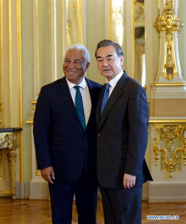 Portuguese Prime Minister Antonio Costa (L) meets with Chinese State Councilor and Foreign Minister Wang Yi in Lisbon, Portugal, May 18, 2018. [Photo: Xinhua]
