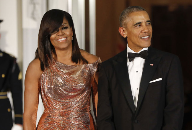 Barack and Michelle Obama [File photo: AP/Pablo Martinez Monsivais]